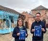 Staff from Preston Park holding up a Sandford award while standing in the Victorian Street.