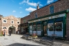 View of the shops at the Victorian street on a sunny day.