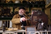 Volunteer inside the ironmonger shop at the Victorian Street.