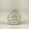 Tub of Victorian rouge makeup.