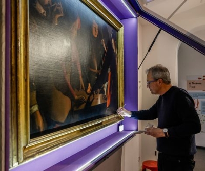 Conservation work is carried out on the famous The Dice Players painting