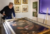 Conservation work is carried out on the famous The Dice Players painting