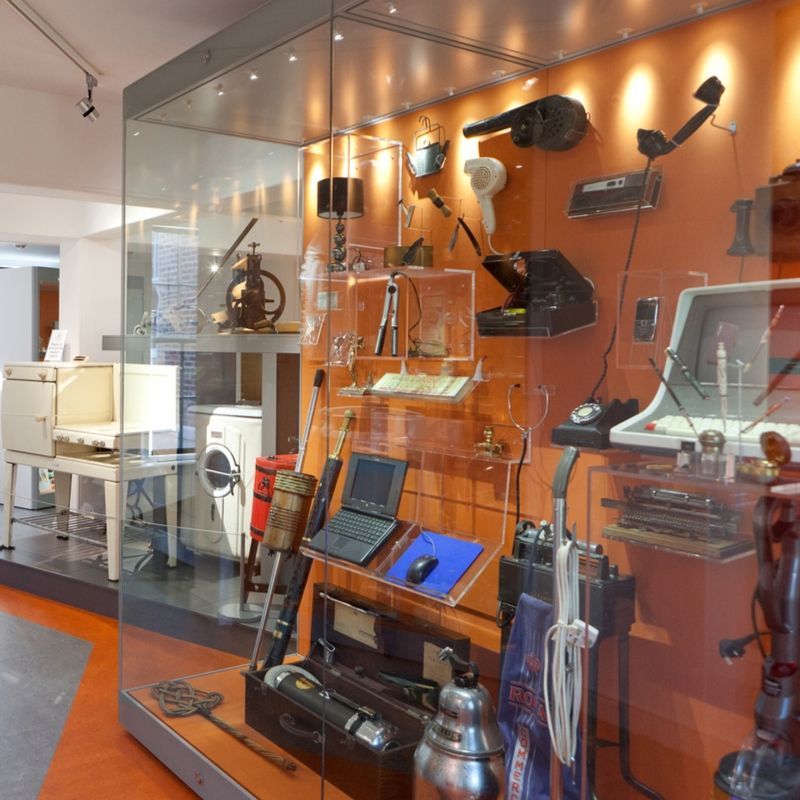 Items On Display In The Gallery Clocking Off Including An Old Hover, Washing Machine And Laptop Gallery Items