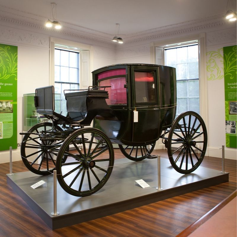 Old Fashioned Carriage In Gallery At Preston Park Museum An image of a Victorian horse drawn carriage