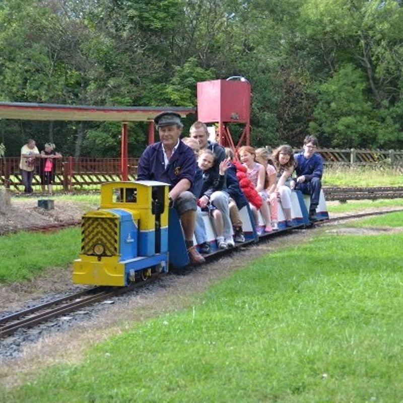Families Taking A Ride On Board The Small Gauge Railway Families Riding The Small Gauge Railway